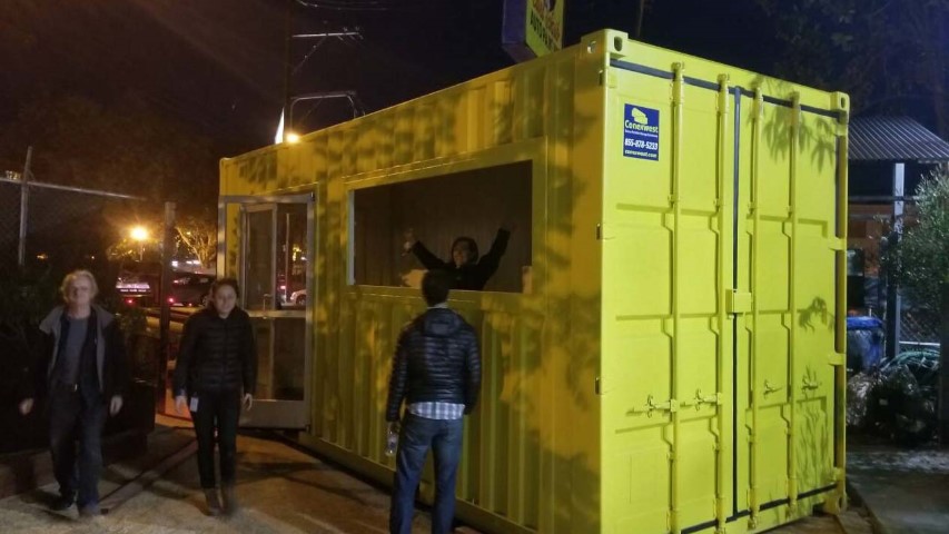 yellow shipping container with cargo doors conexwest sign modified pop up shop shipping container storage containers