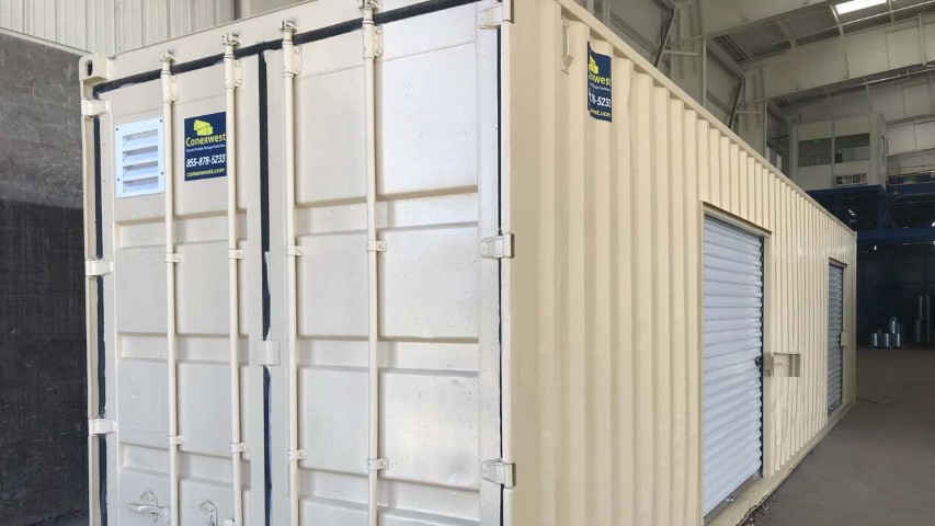 modified container cream color cargo doors with roll up door conexwest sign