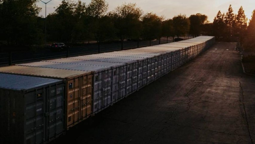 sunset trees orange shipping container storage container line up conexwest containers
