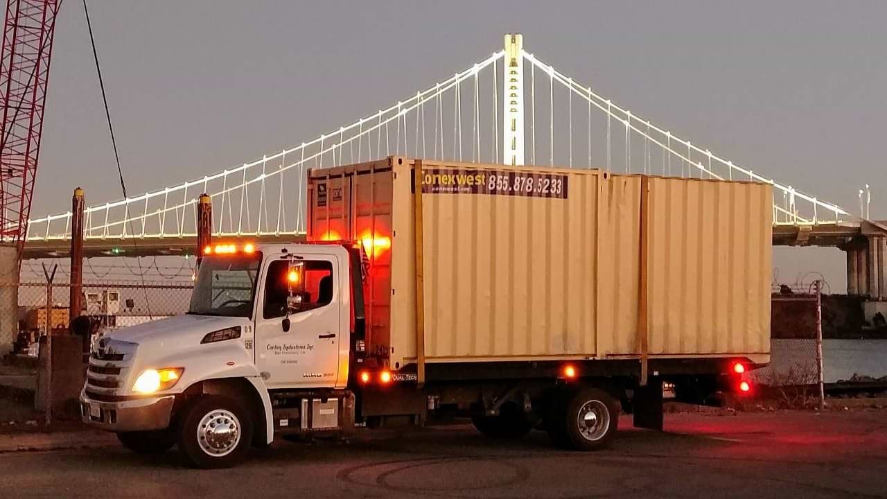 20ft shipping container on a flatbed truck