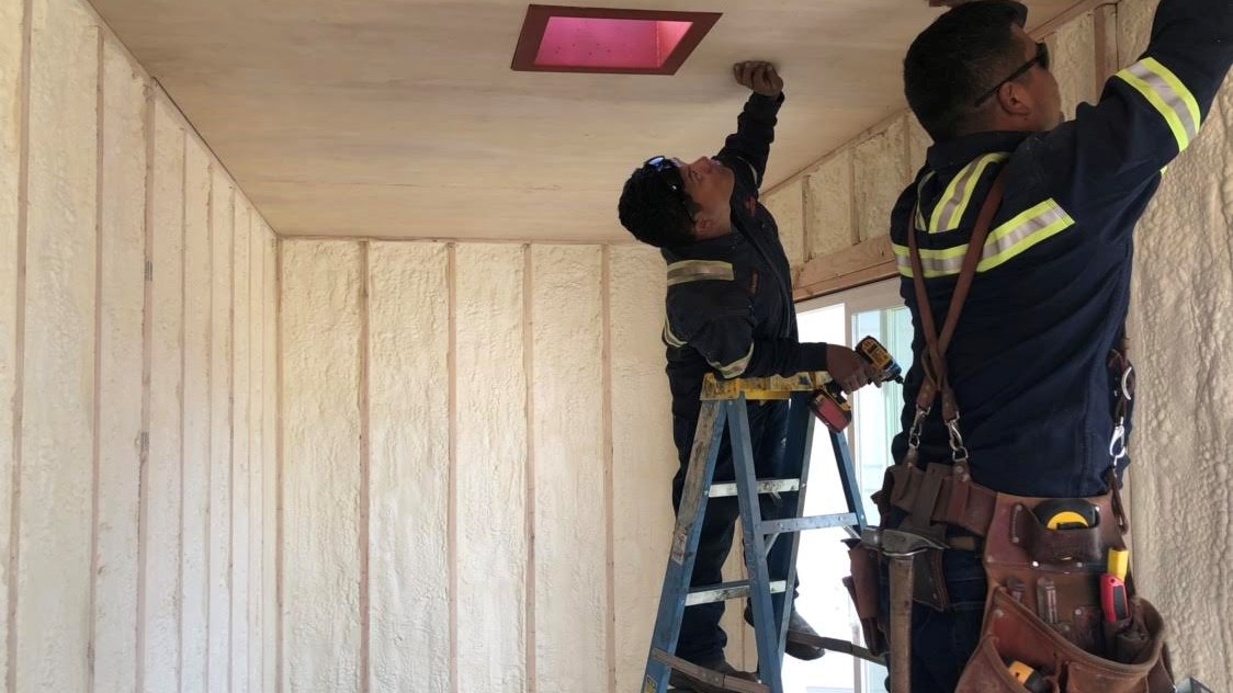 closed cell foam spray inside of shipping container home