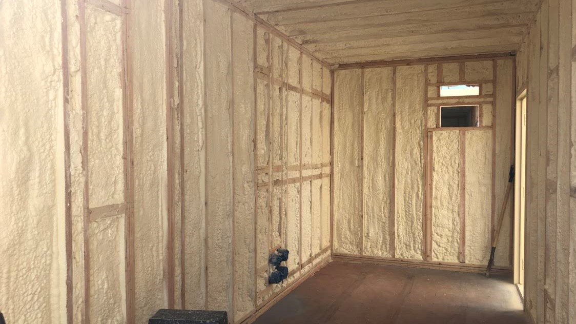 closed cell foam spray inside of shipping container home
