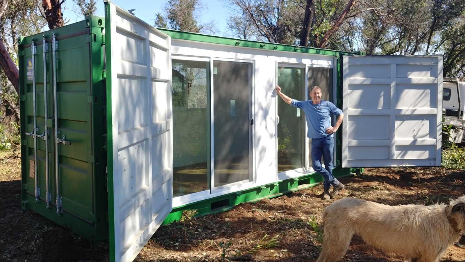 Modified shipping container home green color