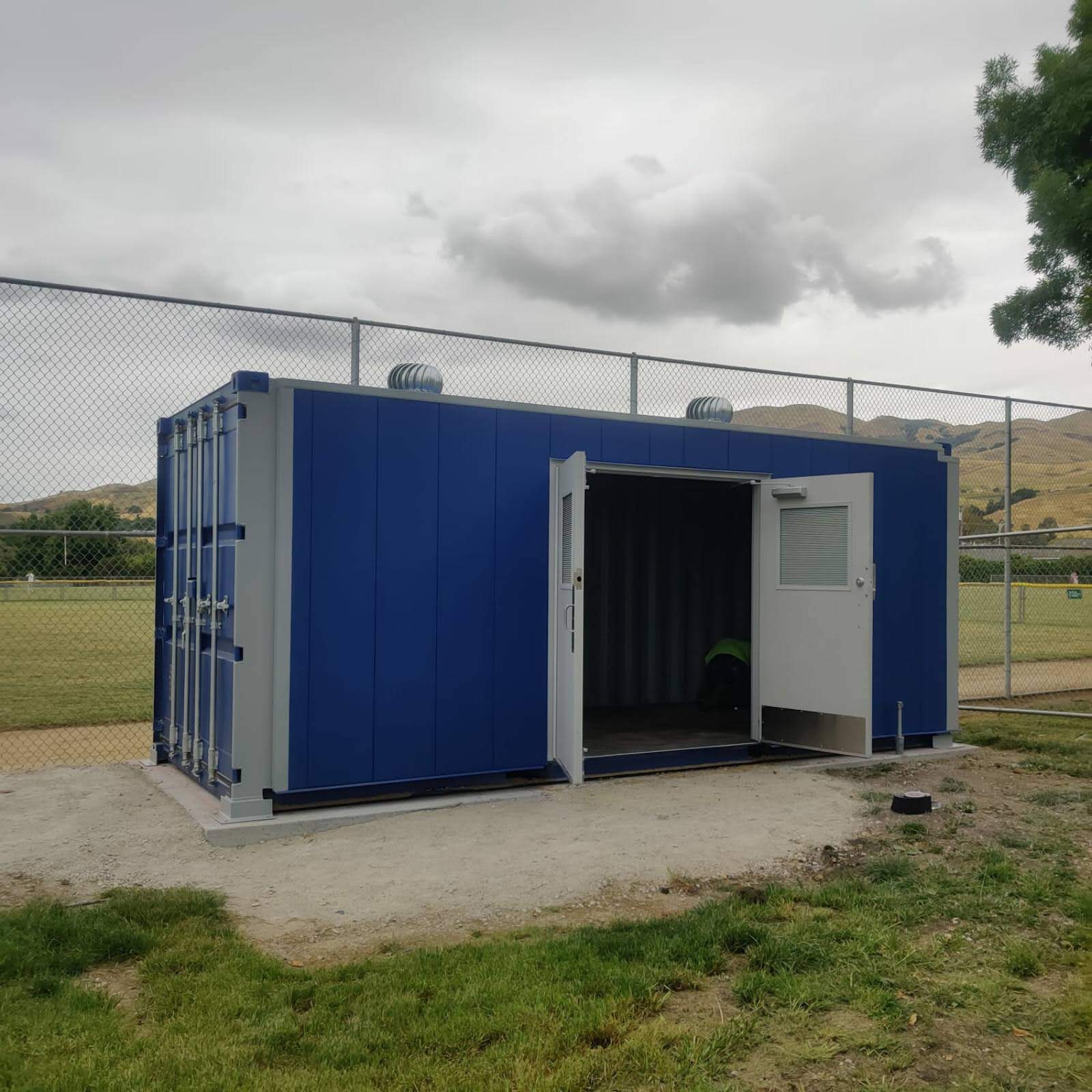 blue shipping storage container with door
