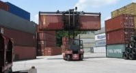 Atlanda georgia depot location from conexwest with a forklift carrying a shipping container