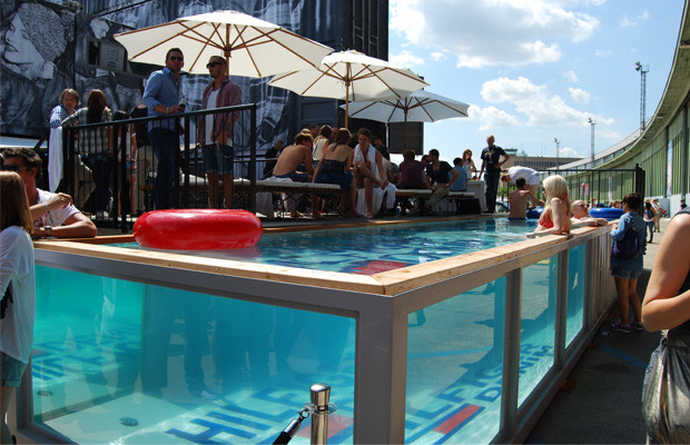 Shipping container swimming pools events with conexwest blue water red bull
